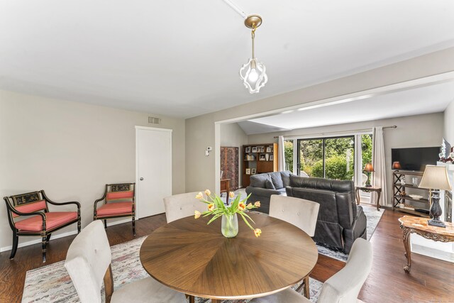 331 Heritage Vlg Unit E, Southbury, CT 06488 - dining space with dark wood-style floors