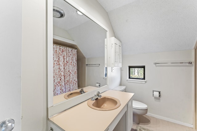331 Heritage Vlg Unit E, Southbury, CT 06488 - full bath with toilet, baseboards, lofted ceiling, vanity, and curtained shower