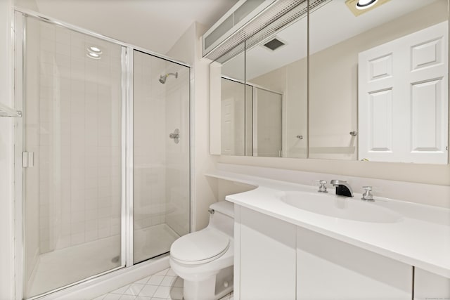 43 Harbor Dr Apt 312, Stamford, CT 06902 - full bath featuring toilet, a shower stall, vanity, and tile patterned flooring