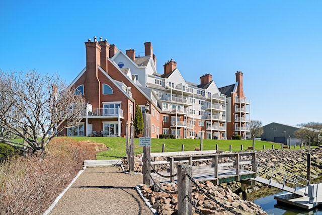 43 Harbor Dr Apt 312, Stamford, CT 06902 - dock featuring a lawn