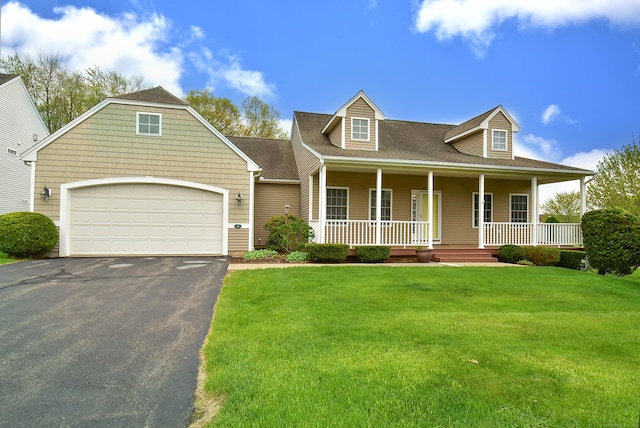 cape cod house featuring an attached garage, a front lawn, driveway, and covered porch