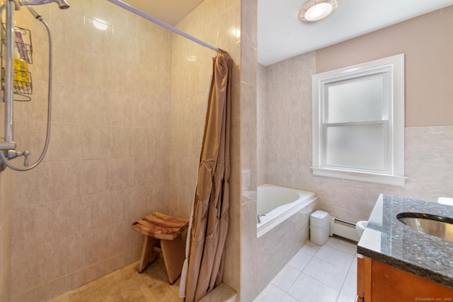 full bathroom featuring vanity, tile patterned floors, a relaxing tiled tub, and tiled shower