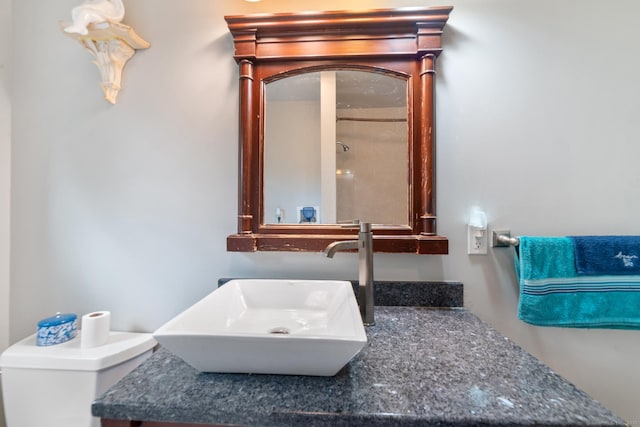 bathroom featuring a sink and toilet