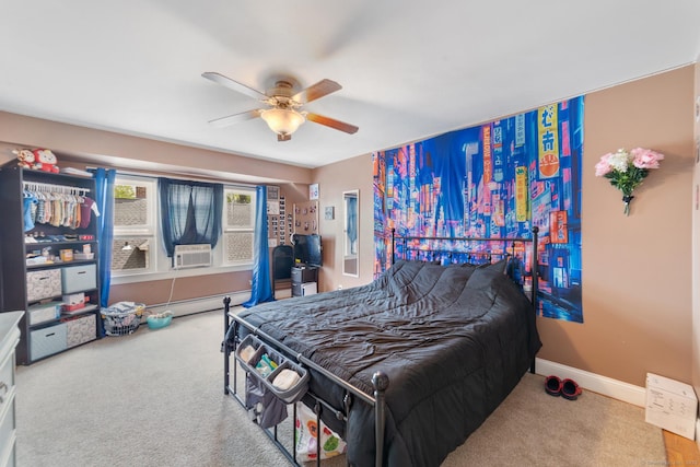 bedroom with baseboards, carpet, ceiling fan, and cooling unit