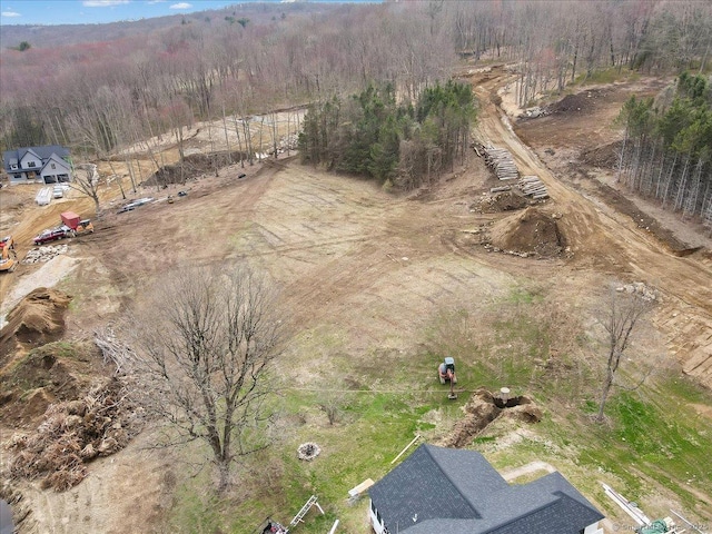 drone / aerial view with a forest view