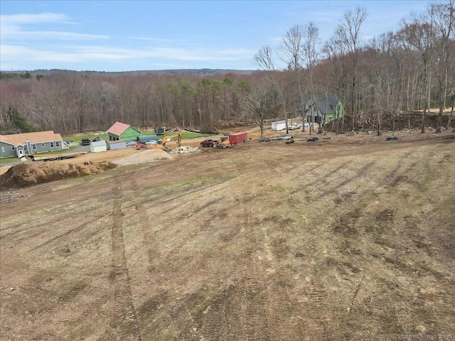 aerial view featuring a view of trees