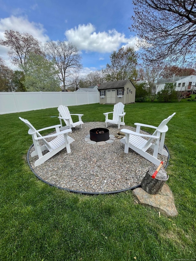 16 Catherine Dr, Wolcott, CT 06716 - view of yard with fence, an outdoor structure, and an outdoor fire pit