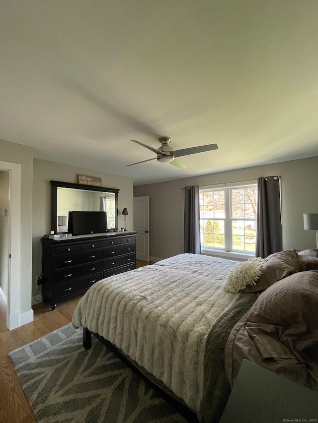 16 Catherine Dr, Wolcott, CT 06716 - bedroom with baseboards, light wood-style flooring, and ceiling fan