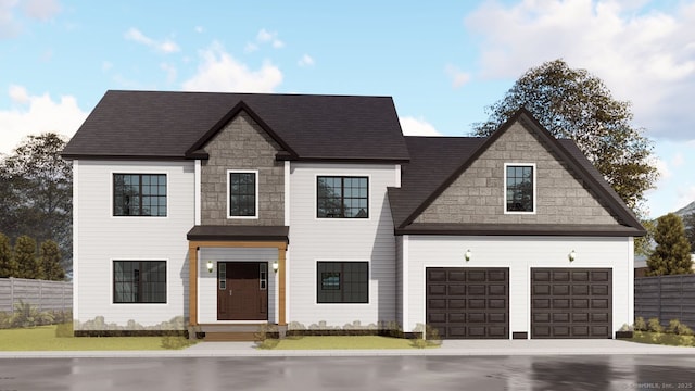 view of front facade with stone siding, fence, concrete driveway, and an attached garage