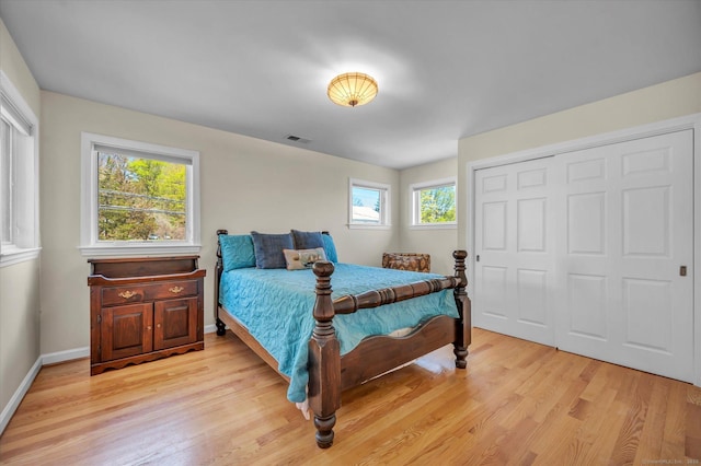 355 W Lake St, Winchester, CT 06098 - bedroom with light wood-style floors, baseboards, a closet, and visible vents