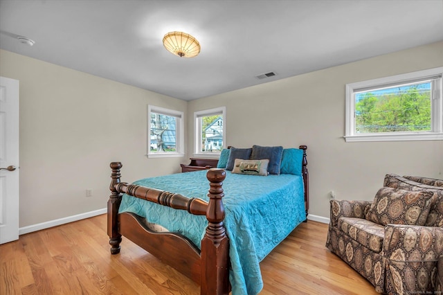 355 W Lake St, Winchester, CT 06098 - bedroom featuring multiple windows, light wood finished floors, and visible vents