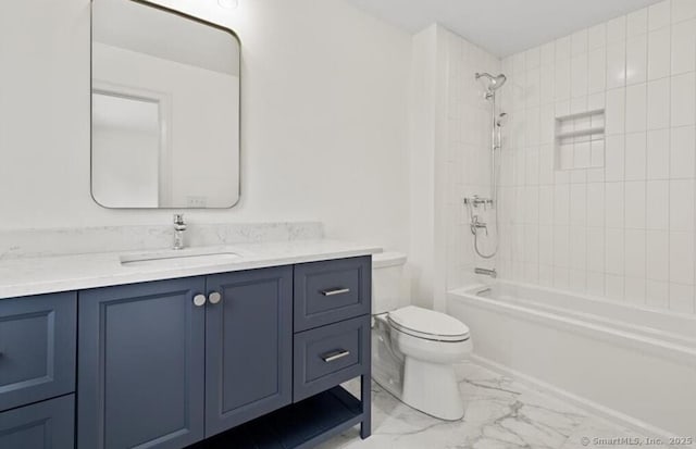 full bath with toilet, shower / washtub combination, marble finish floor, and vanity