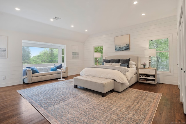 bedroom with vaulted ceiling, dark wood-style floors, and recessed lighting