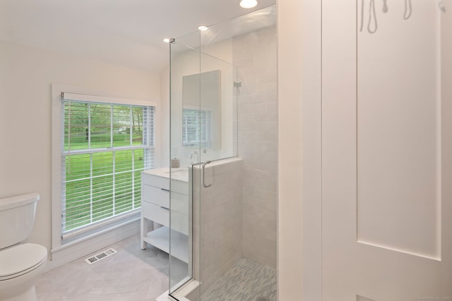 full bathroom with toilet, a shower stall, tile patterned floors, vaulted ceiling, and recessed lighting