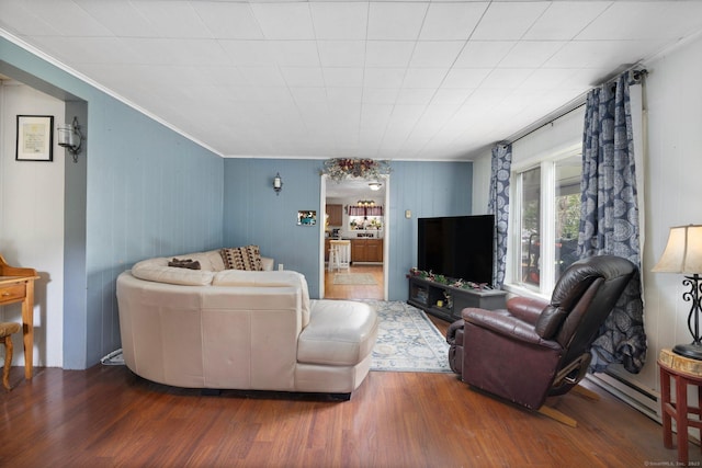 200 Mechanic St, Killingly, CT 06239 - living area with wood finished floors, crown molding, and a baseboard radiator