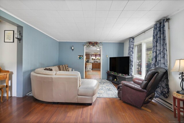 200 Mechanic St, Killingly, CT 06239 - living room with wood finished floors, ornamental molding, and a baseboard heating unit
