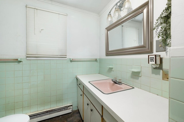 200 Mechanic St, Killingly, CT 06239 - half bathroom with baseboard heating, ornamental molding, vanity, tile walls, and wainscoting