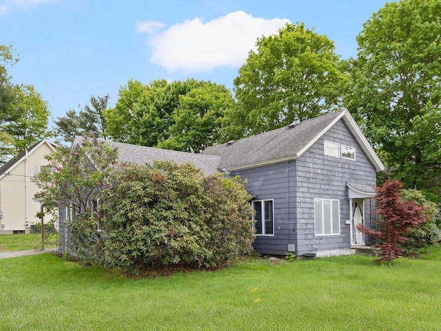 200 Mechanic St, Killingly, CT 06239 - view of front facade with a front lawn and roof with shingles