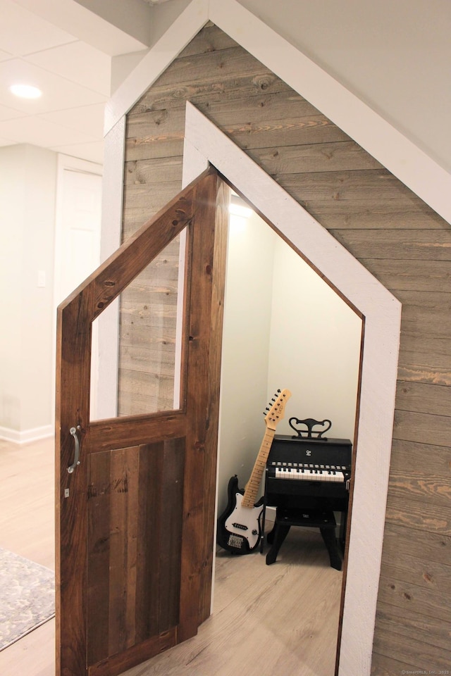 bonus room with wood finished floors and recessed lighting