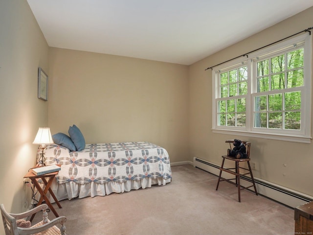 carpeted bedroom with a baseboard radiator