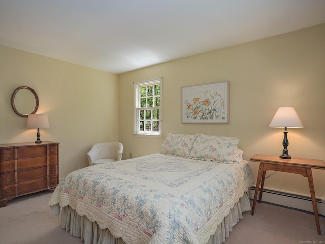 bedroom featuring carpet flooring and a baseboard radiator