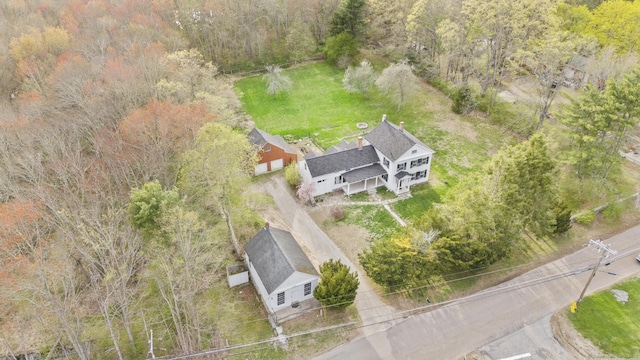 aerial view featuring a view of trees