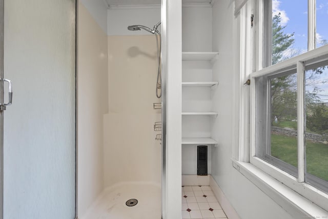 bathroom featuring a shower stall
