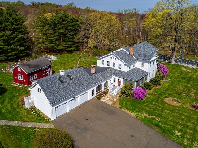 aerial view featuring a view of trees