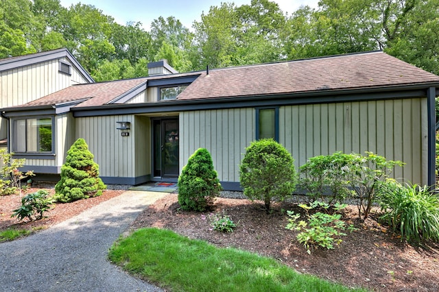 951 Heritage Vlg Unit B, Southbury, CT 06488 - mid-century inspired home with a shingled roof and a chimney