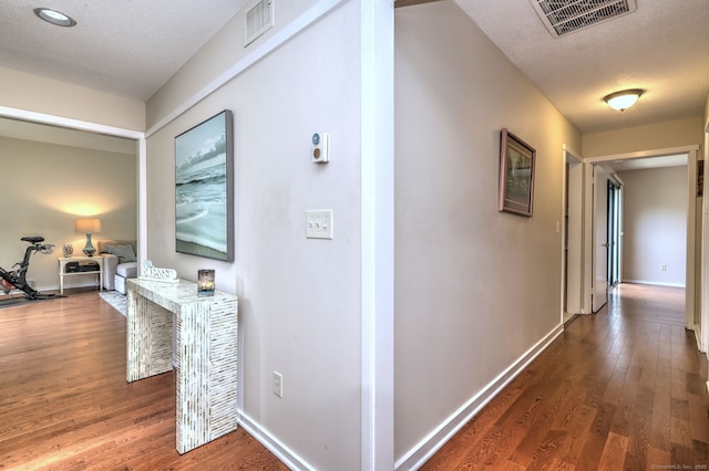 951 Heritage Vlg Unit B, Southbury, CT 06488 - corridor with wood finished floors and a textured ceiling