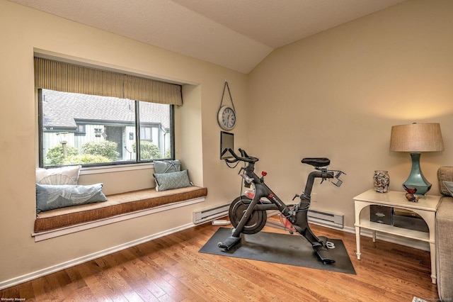 951 Heritage Vlg Unit B, Southbury, CT 06488 - exercise area with wood finished floors, a baseboard radiator, and vaulted ceiling