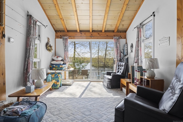 sitting room with wooden ceiling, plenty of natural light, beamed ceiling, and high vaulted ceiling