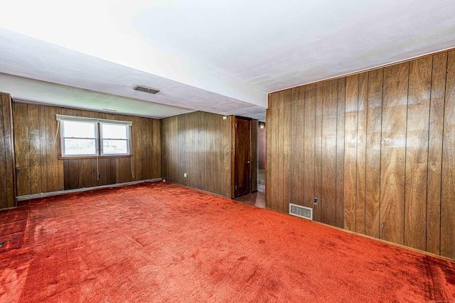 185 Daniel Rd, Hamden, CT 06517 - spare room featuring visible vents, carpet floors, and wooden walls