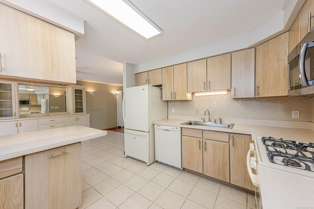 185 Daniel Rd, Hamden, CT 06517 - kitchen featuring white appliances, light countertops, a sink, and light brown cabinets