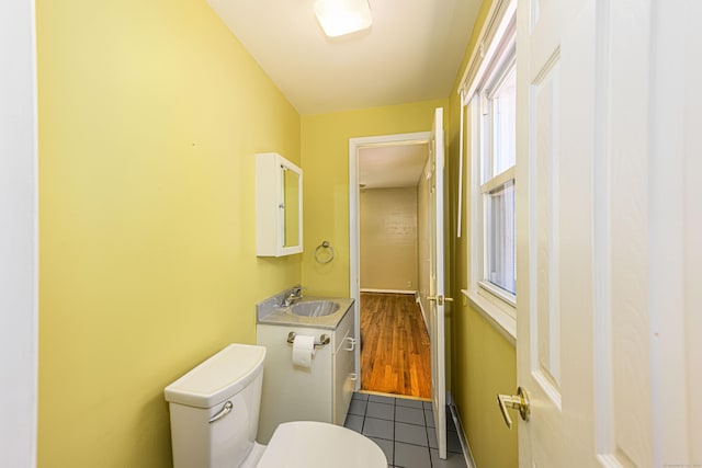 185 Daniel Rd, Hamden, CT 06517 - half bath featuring a sink, tile patterned floors, and toilet