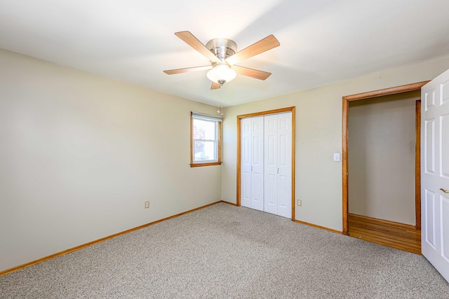 185 Daniel Rd, Hamden, CT 06517 - unfurnished bedroom with baseboards, ceiling fan, carpet, and a closet