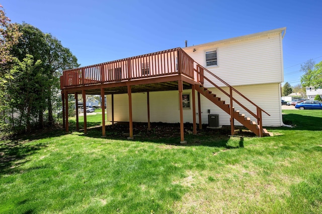185 Daniel Rd, Hamden, CT 06517 - back of property featuring a yard, stairway, a wooden deck, and central air condition unit