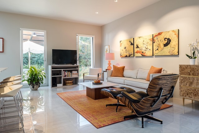 living room featuring recessed lighting
