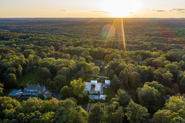 aerial view with a wooded view