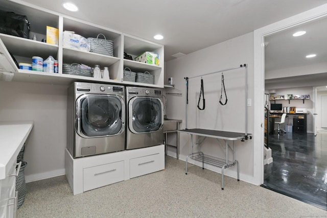 washroom featuring separate washer and dryer, baseboards, laundry area, and recessed lighting