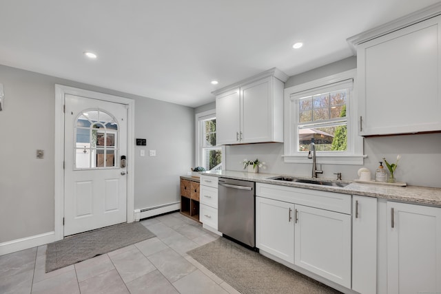 kitchen featuring baseboard heating, dishwasher, a sink, recessed lighting, and white cabinetry