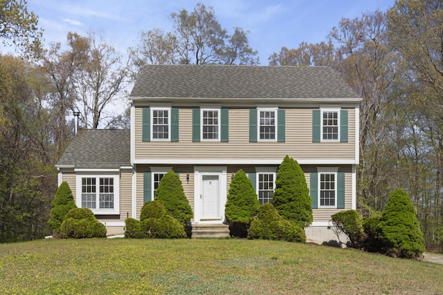 4 Davis Farm Rd, Clinton, CT 06413 - colonial inspired home with a front yard and a shingled roof