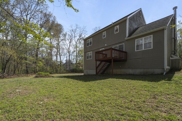 4 Davis Farm Rd, Clinton, CT 06413 - back of property featuring stairs, a deck, and a lawn