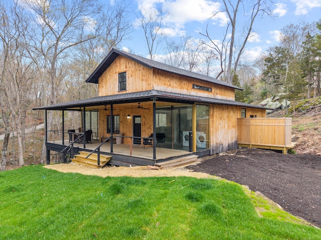 32 Cream Pot Rd, Clinton, CT 06413 - rear view of property featuring a lawn, a ceiling fan, and a deck