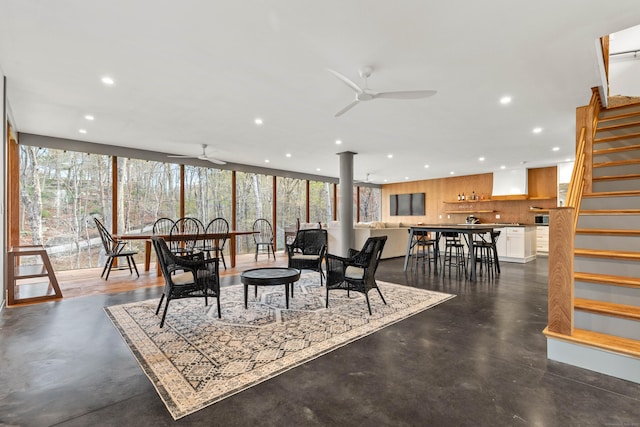 32 Cream Pot Rd, Clinton, CT 06413 - living area featuring recessed lighting, ceiling fan, concrete flooring, and stairway