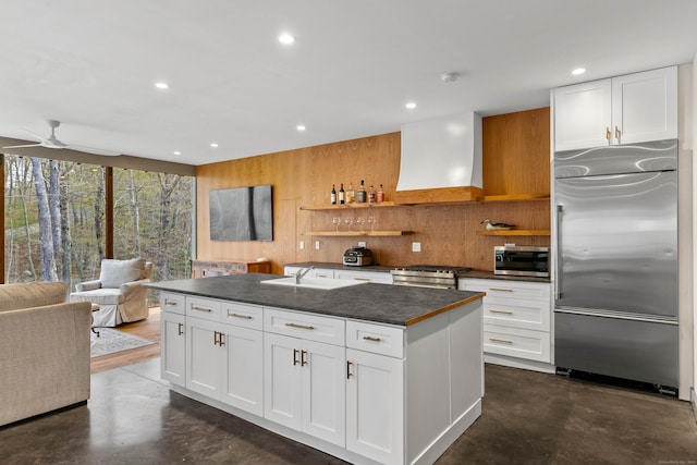 32 Cream Pot Rd, Clinton, CT 06413 - kitchen with dark countertops, appliances with stainless steel finishes, concrete flooring, and a sink