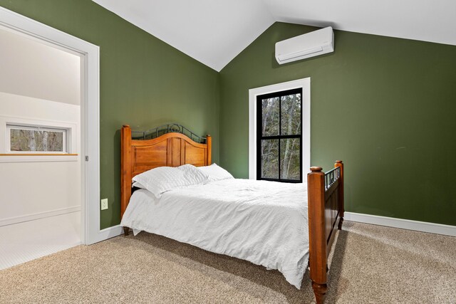 32 Cream Pot Rd, Clinton, CT 06413 - bedroom with carpet flooring, baseboards, a wall unit AC, and lofted ceiling
