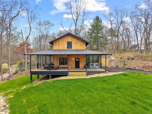 32 Cream Pot Rd, Clinton, CT 06413 - back of house with a lawn, a deck, and a sunroom