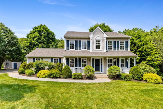 199 Dennison Rdg, Manchester, CT 06040 - colonial inspired home featuring a front lawn, a porch, and roof with shingles