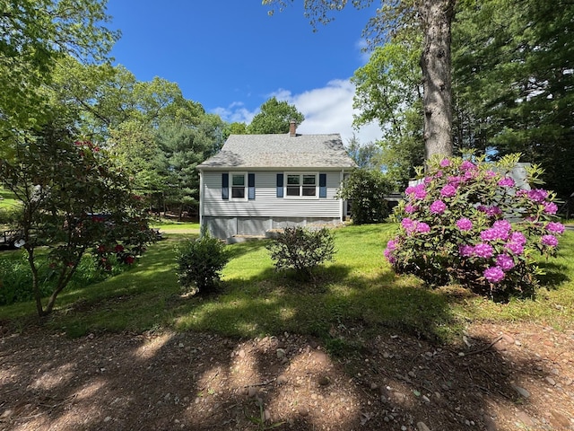 17 Green Rd, Vernon, CT 06066 - back of property featuring a chimney and a lawn